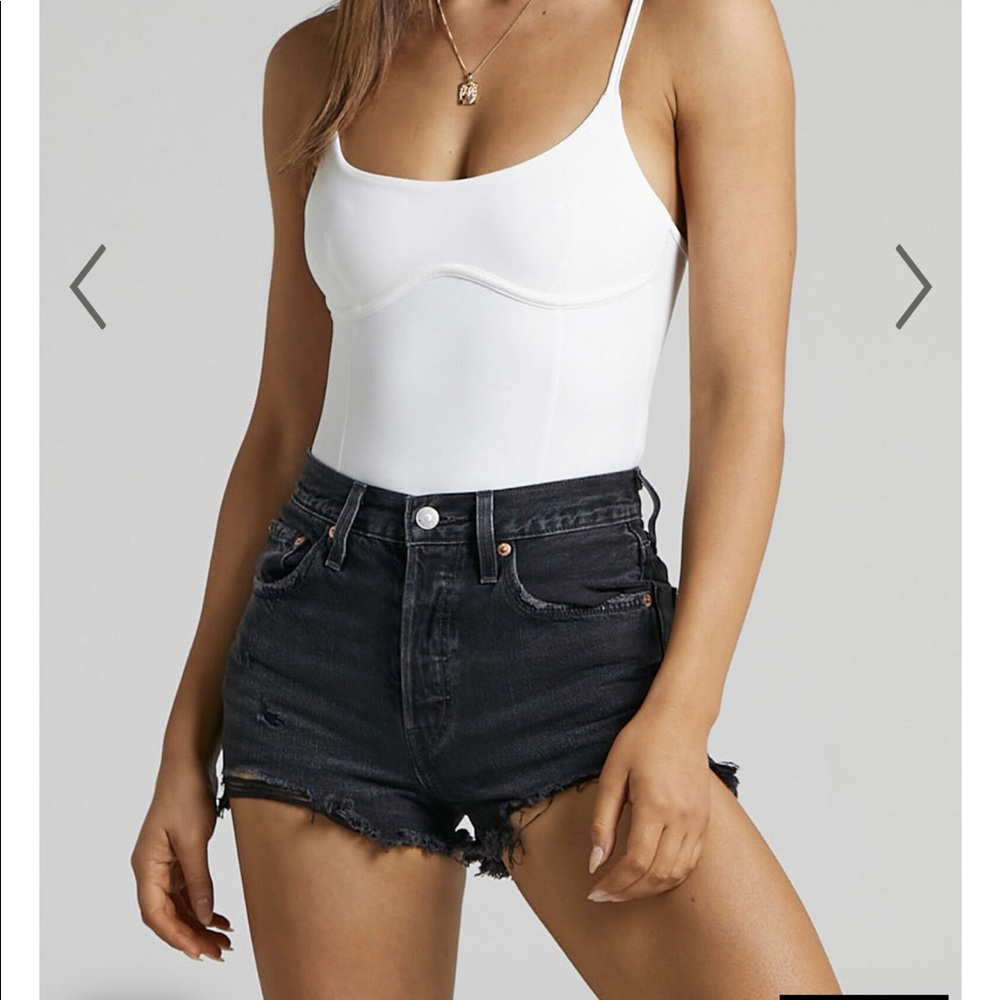 Black ripped Levi’s jean shorts